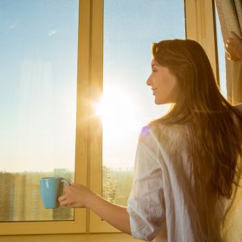 lady looking out window